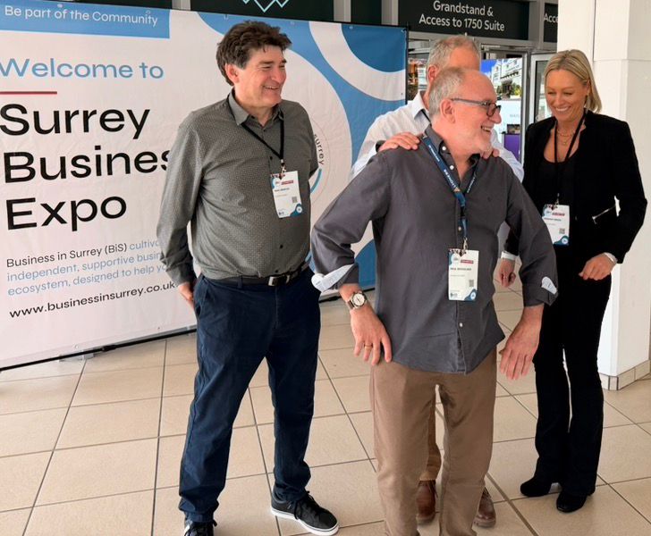 Guests at the Surrey Business Expo welcome banner